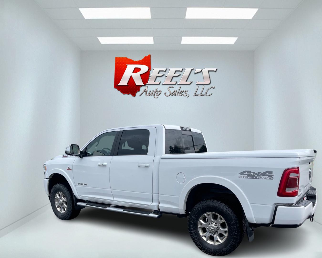 2020 White /Black RAM 2500 Laramie Crew Cab SWB 4WD (3C6UR5FL7LG) with an 6.7L I6 OHV 24V TURBO DIESEL engine, 6A transmission, located at 11115 Chardon Rd. , Chardon, OH, 44024, (440) 214-9705, 41.580246, -81.241943 - This 2020 Ram 2500 Laramie Crew Cab is a powerhouse pickup truck designed for serious towing and hauling capabilities. Under the hood lies a 6.7L Cummins Turbo Diesel engine mated to a 6-speed 68RFE transmission with 3.73 gearing, producing an impressive 370 hp and a staggering 850 lb-ft of torque. - Photo#7